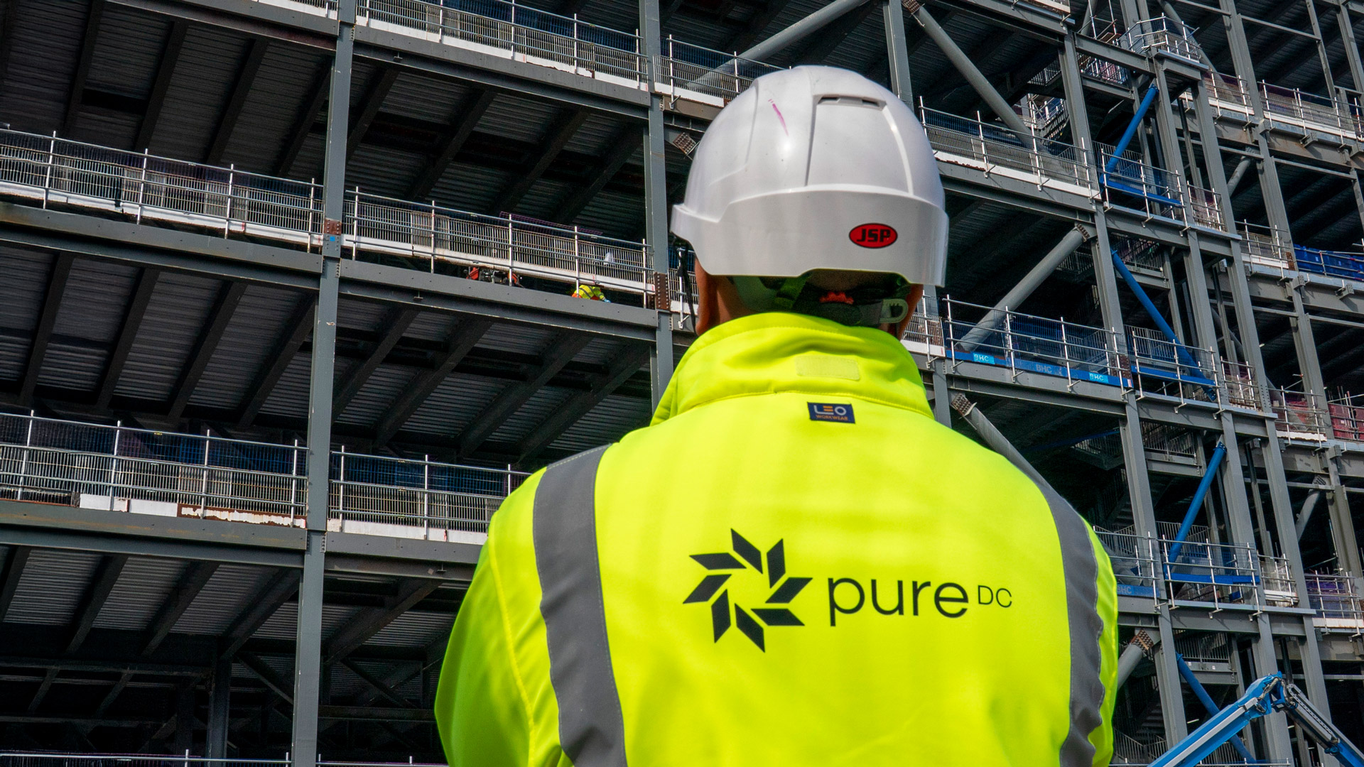 Man in Pure DC yellow vest